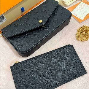 Louis Vuitton Black Embossed Clutch and Wristlet